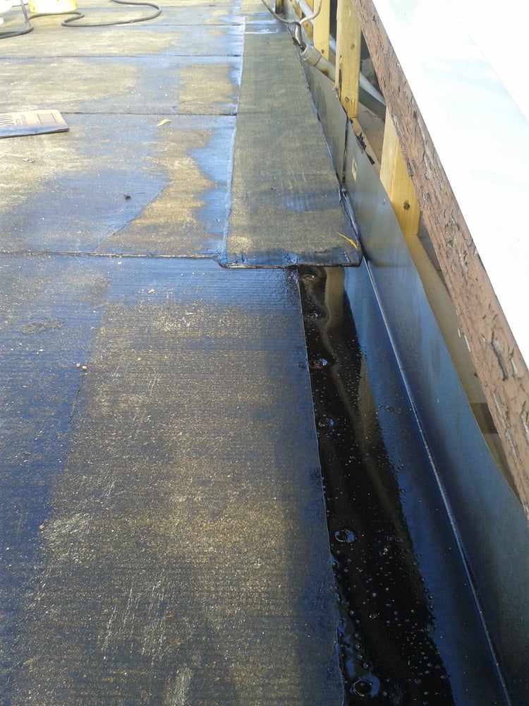 Slide of Anchor Roofing Services