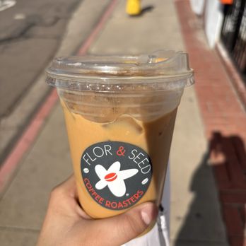 FLOR & SEED - Iced cafe de olla w/ oatmilk - Themed Cafes Near Me - San Diego, California