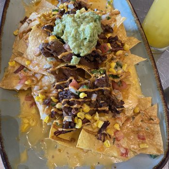 Knotty Deck Kitchen & Bar - Brisket Nachos!! - Bars Near Me - Austin, Texas