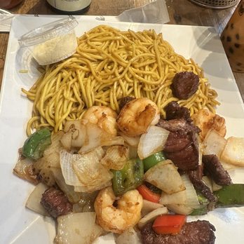 Hiccups & Churroholic - Garlic Noodles with Shaken Beef - Asian Fusion Near Me - Tampa, Florida Hiccups & Churroholic - Garlic Noodles with Shaken Beef - Asian Fusion Near Me - Tampa, Florida