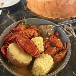 The crawfish seafood boil single item add potatoes and corn!