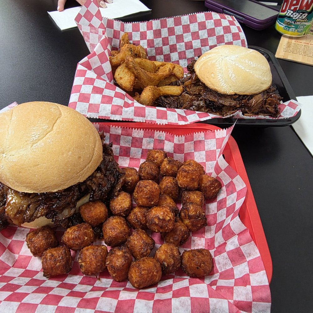 The Butcher Block - BBQ Brisket sandwich with sweet potato tots in front. Rear is bbq Brisket sandwich with sidewinder fries. - Meat Shops Near Me - Las Vegas, Nevada The Butcher Block - BBQ Brisket sandwich with sweet potato tots in front. Rear is bbq Brisket sandwich with sidewinder fries. - Meat Shops Near Me - Las Vegas, Nevada