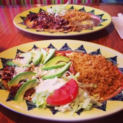 El Mariachi Mexican Bar & Grill - Chilaquiles. & Chori-Pollo in the background. They will make your mouth water.