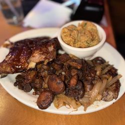 Texas Roadhouse - Steak & ribs combo with rice , onion and mushrooms.