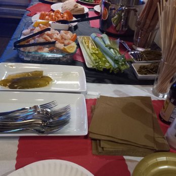 Hurry Back Bar - a table full of food - Sports Bars Near Me - Ecorse, Michigan