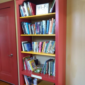 The Red Porch Cafe - a bookcase filled with books - Coffee & Tea Near Me - New Baden, Illinois The Red Porch Cafe - a bookcase filled with books - Coffee & Tea Near Me - New Baden, Illinois