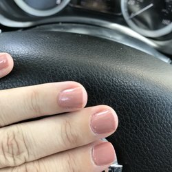 Solar Nails - Awful. Didn't file my nails all the way, painted over dust and my cuticles that she was suppose to cut. Left bubbles in the top coat.