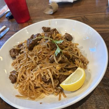 Kin.D96 - Pad Thai with steak. The steak was very tender and the little crunch of the peanuts and zest of the lemon was superb. - Sushi Bars Near Me - Warner Robins, Georgia