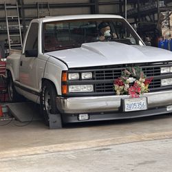 Peng's Smog Check Station - 89 Chevrolet on the platform for smog