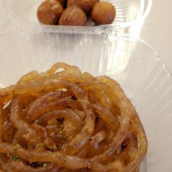 Cakey Bakey - Zoolbia - like a mini funnel cake but crispy and syrupy at the same time Bamieh - like mini donut holes coated in syrup - Bakeries Near Me - San Diego, California Cakey Bakey - Zoolbia - like a mini funnel cake but crispy and syrupy at the same time Bamieh - like mini donut holes coated in syrup - Bakeries Near Me - San Diego, California