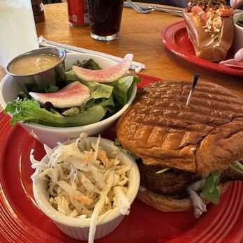 Jack’s Surf & Turf - Grouper on a brioche bun and side salad - Seafood Near Me - Montclair, New Jersey