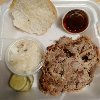 Dutch Inn West Inc - Pulled pork sandwich to go! Came with either potato salad or coleslaw - Dive Bars Near Me - Elgin, Illinois