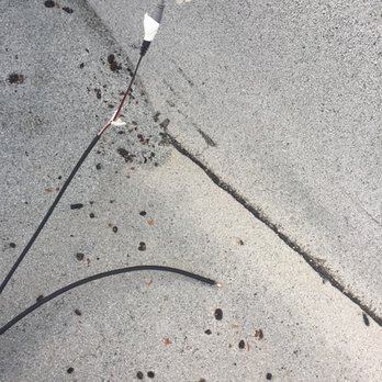 M & H Industries - The wires are not even connected with wire connectors, just white tape, not even electrical tape.  Keep in mind this is on my roof. - Security Systems Near Me