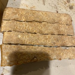 Pizza Hut - These are "bread sticks". It is plain bread with absolutely nothing on it.