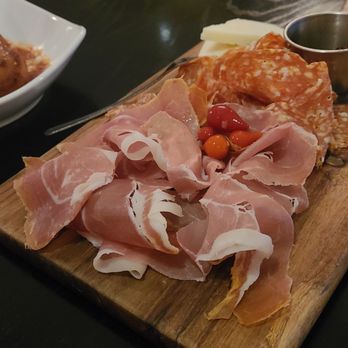 Osteria da Nino - Charcuterie board with salami, pecorino, and prosciutto - Italian Near Me - Arlington, Virginia Osteria da Nino - Charcuterie board with salami, pecorino, and prosciutto - Italian Near Me - Arlington, Virginia