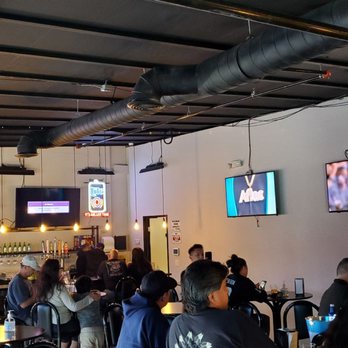 Wings on Tap - a large group of people in a bar - Chicken Wings Near Me - West Covina, California Wings on Tap - a large group of people in a bar - Chicken Wings Near Me - West Covina, California