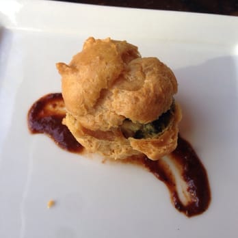 TwentyTwenty Grille - Spinach duck confit and mole sauce and Brie cheese amuse bouche - New American Near Me - Boca Raton, Florida TwentyTwenty Grille - Spinach duck confit and mole sauce and Brie cheese amuse bouche - New American Near Me - Boca Raton, Florida