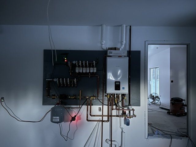 Slide of Carlos' Plumbing and Heating