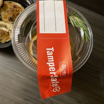 Flavorture - Look at this rosemary sprig, all folded up and tender against the lid... - Bars Near Me - Washington, DC, District of Columbia