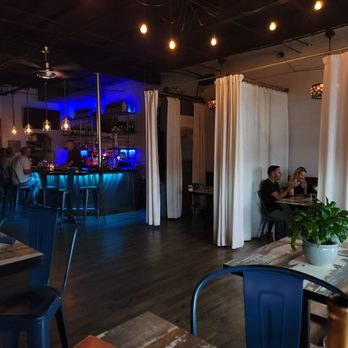 Flavour Kitchen & Wine Bar - Cozy seating - Wine Bars Near Me - Cocoa Beach, Florida Flavour Kitchen & Wine Bar - Cozy seating - Wine Bars Near Me - Cocoa Beach, Florida