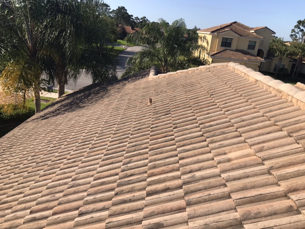 Slide of Andy The Roofer & Co