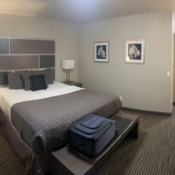 Crescent Bay Inn - Room 111, king bed, tv, desk, AC
