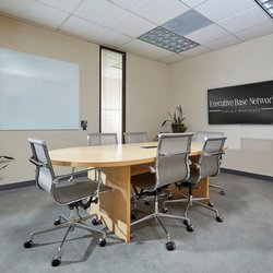 Executive Base Network - 6 person conference room - 65" monitor, 6' glassboard, air purifier
