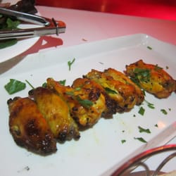 Persian Basement - Chicken wing & leg pieces marinated in lemon juice, saffron, olive oil char grill