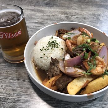 Ceviche 19 - Saltado Mixto with a great tasting Pilsen (Peruvian Beer) - Peruvian Near Me - Anaheim, California