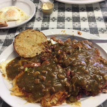 Mountain Lyon Cafe - Corned beef, eggs, hash browns smothered in award winning pork green chili. Sooo good! - Breakfast & Brunch Near Me - Silverthorne, Colorado Mountain Lyon Cafe - Corned beef, eggs, hash browns smothered in award winning pork green chili. Sooo good! - Breakfast & Brunch Near Me - Silverthorne, Colorado