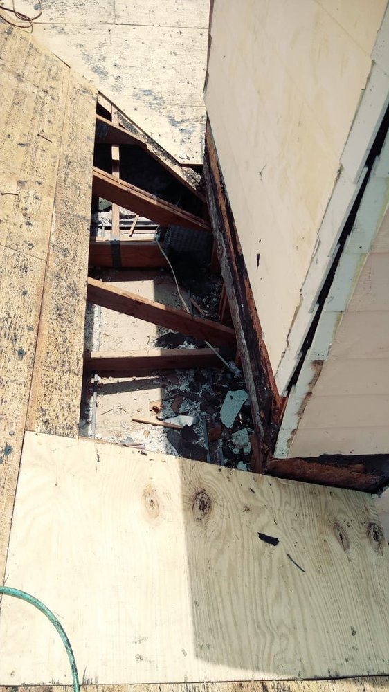 Slide of D-Tech Roofing