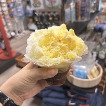 Haleiwa Town Shave Ice - Mango and lychee syrups, azuki beans at the base, and topped off condensed milk - Shaved Ice Near Me - Honolulu, Hawaii