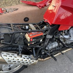 Marathon Motel & RV Park - My clotheless Moto Guzzi waiting for its good Samaritan!