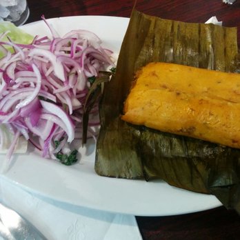 The Rockin Chicken - Tamal, with a side of tangy onion salad! - Peruvian Near Me - Hartford, Connecticut The Rockin Chicken - Tamal, with a side of tangy onion salad! - Peruvian Near Me - Hartford, Connecticut