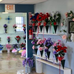 Chicky's Florist - We offer a variety of silk floral arrangements.