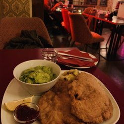 Zur Rose - German schnitzel! Served with cucumber dill salad and potatoes.