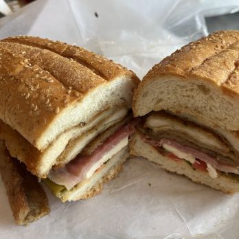 Cutting Wedge - Chicken and eggplant grinder with mozzarella cheese and long hot peppers. Great sandwich. - Delis Near Me - Stratford, Connecticut Cutting Wedge - Chicken and eggplant grinder with mozzarella cheese and long hot peppers. Great sandwich. - Delis Near Me - Stratford, Connecticut