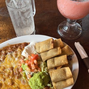 Mexico Restaurant - Taquitos and beans. The Guacamole is pre made commercial not fresh. - Mexican Near Me - Honolulu, Hawaii