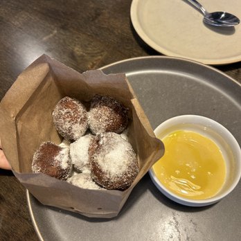 Olio - a plate of donuts and a bowl of sauce - Italian Near Me - Bayport, Minnesota Olio - a plate of donuts and a bowl of sauce - Italian Near Me - Bayport, Minnesota