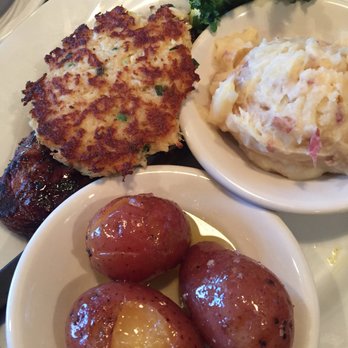 Roosterfish Grill - Steak with crabby patty. Sauce on the side. Taters and garlic mash. Mmmmm... - Seafood Near Me - Largo, Florida Roosterfish Grill - Steak with crabby patty. Sauce on the side. Taters and garlic mash. Mmmmm... - Seafood Near Me - Largo, Florida