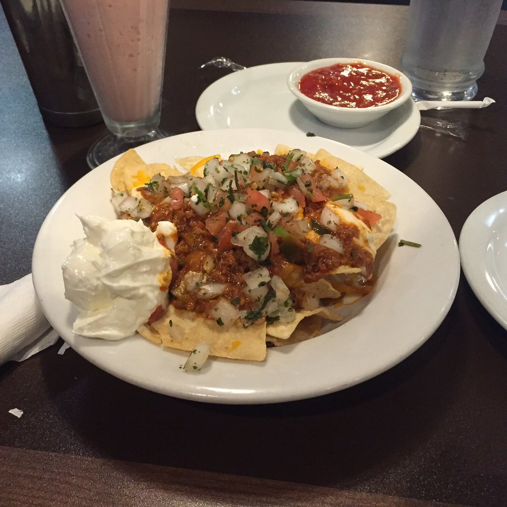 Denny's Restaurant Crossroads - Half plate of Denny's zesty nachos - American Near Me - Calgary, Alberta