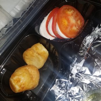 Fogo de Chão - Caprese Salad & Pao De Queijo (Brazilian Cheese Bread) - Brazilian Near Me - Austin, Texas Fogo de Chão - Caprese Salad & Pao De Queijo (Brazilian Cheese Bread) - Brazilian Near Me - Austin, Texas
