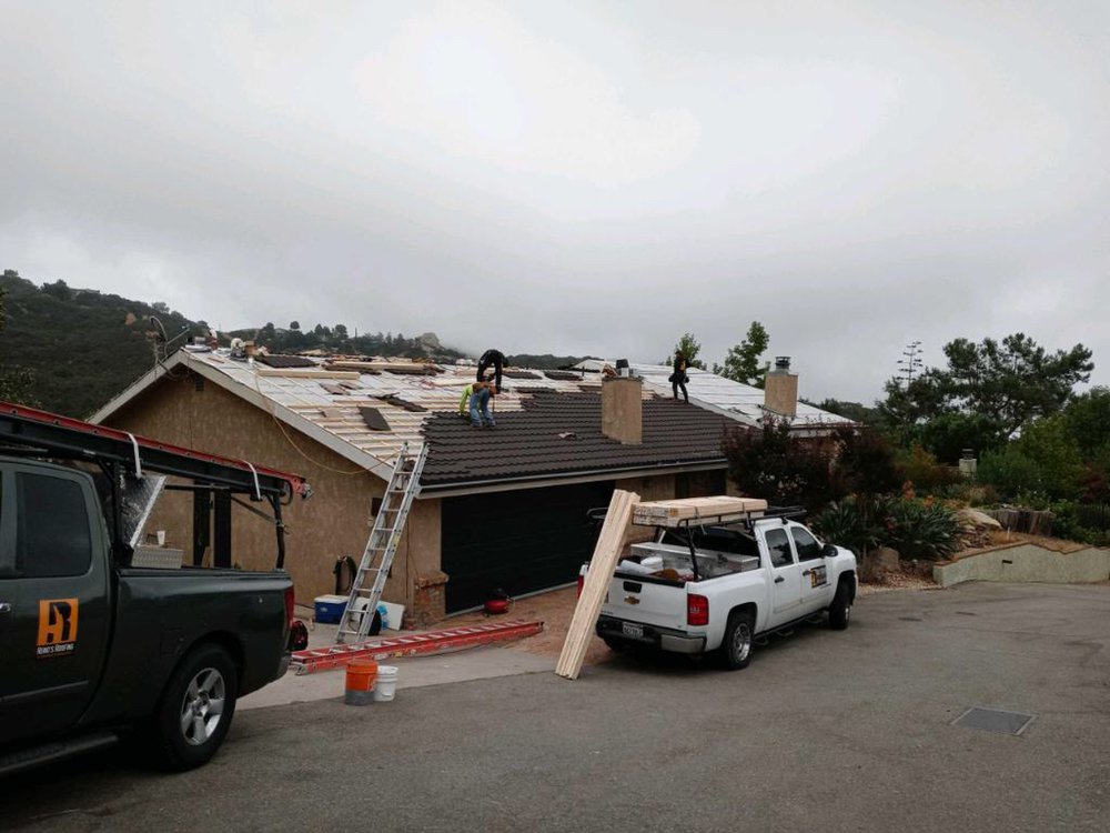 Slide of Reno's Roofing