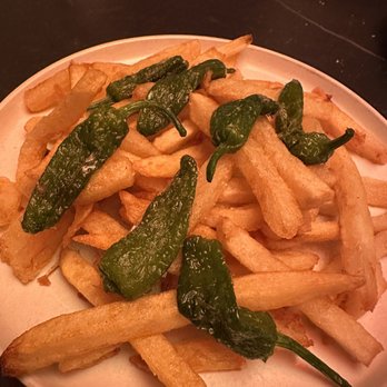 Leña - Side of fries and peppers accompanied the crispy pork - Catalan Near Me - New York, New York Leña - Side of fries and peppers accompanied the crispy pork - Catalan Near Me - New York, New York