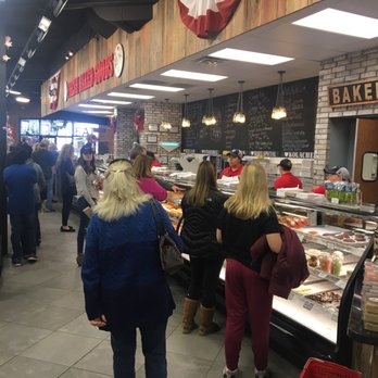 Slovacek's West - A line of folks buying freshly baked Slap Yo Momma Good kolaches - Bakeries Near Me - West, Texas