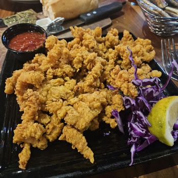 Trapper's Fishcamp & Grill - Appitizer of fried clams. - Seafood Near Me - Oklahoma City, Oklahoma Trapper's Fishcamp & Grill - Appitizer of fried clams. - Seafood Near Me - Oklahoma City, Oklahoma
