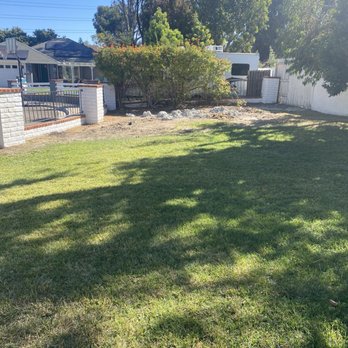 Hernandez Brothers Landscaping - Pikes of concrete poured and left in yard. No cleanup. - Lawn Services Near Me Hernandez Brothers Landscaping - Pikes of concrete poured and left in yard. No cleanup. - Lawn Services Near Me