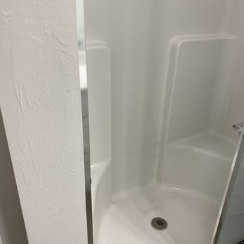 Your Way Cleaning Services - Shower (the floor has black spots in it before Natasha cleaned it) - Home Cleaning Near Me Your Way Cleaning Services - Shower (the floor has black spots in it before Natasha cleaned it) - Home Cleaning Near Me