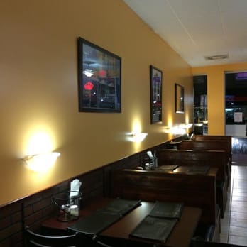 Jenk's Pizza - Beautiful art work on the walls and nice brick walls! - Pizza Near Me - St Johns, Florida Jenk's Pizza - Beautiful art work on the walls and nice brick walls! - Pizza Near Me - St Johns, Florida