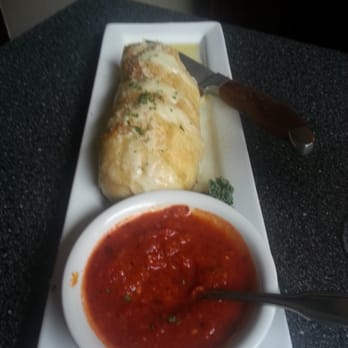 Johnny Manhattan's - Nancy's Garlic bread stuffed with cheese. - Steakhouses Near Me - Hubertus, Wisconsin
